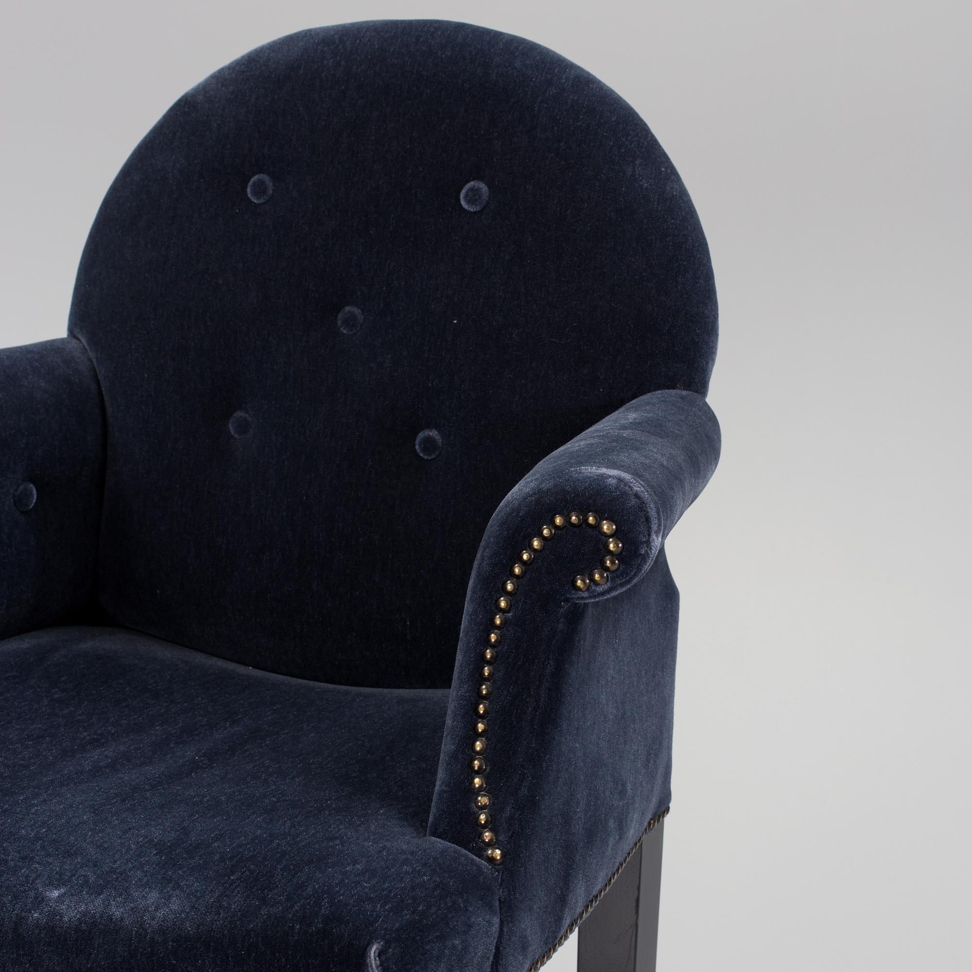 A pair of "The Simplified Moonback Counter Height Stool" barstools by Soane Britain.