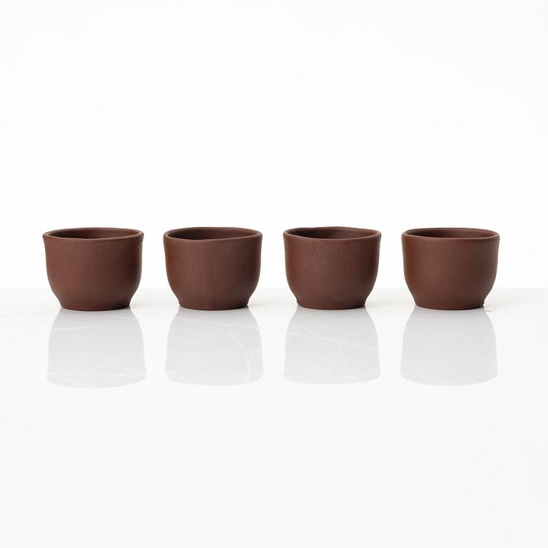 Wu Quan Xiang, A Chinese yixing teapot and a bowl with sieve and four cups, 1980s.