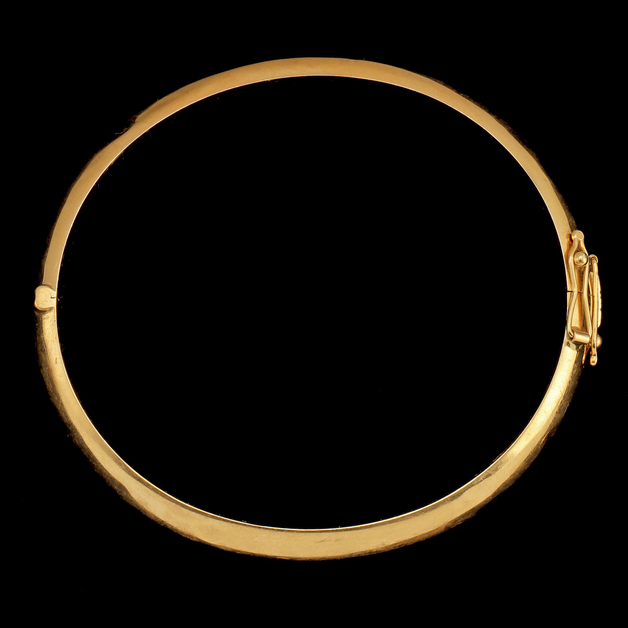 ARMRING, guld, 18k, stmpl B&H, 1961. Vikt 14 g.