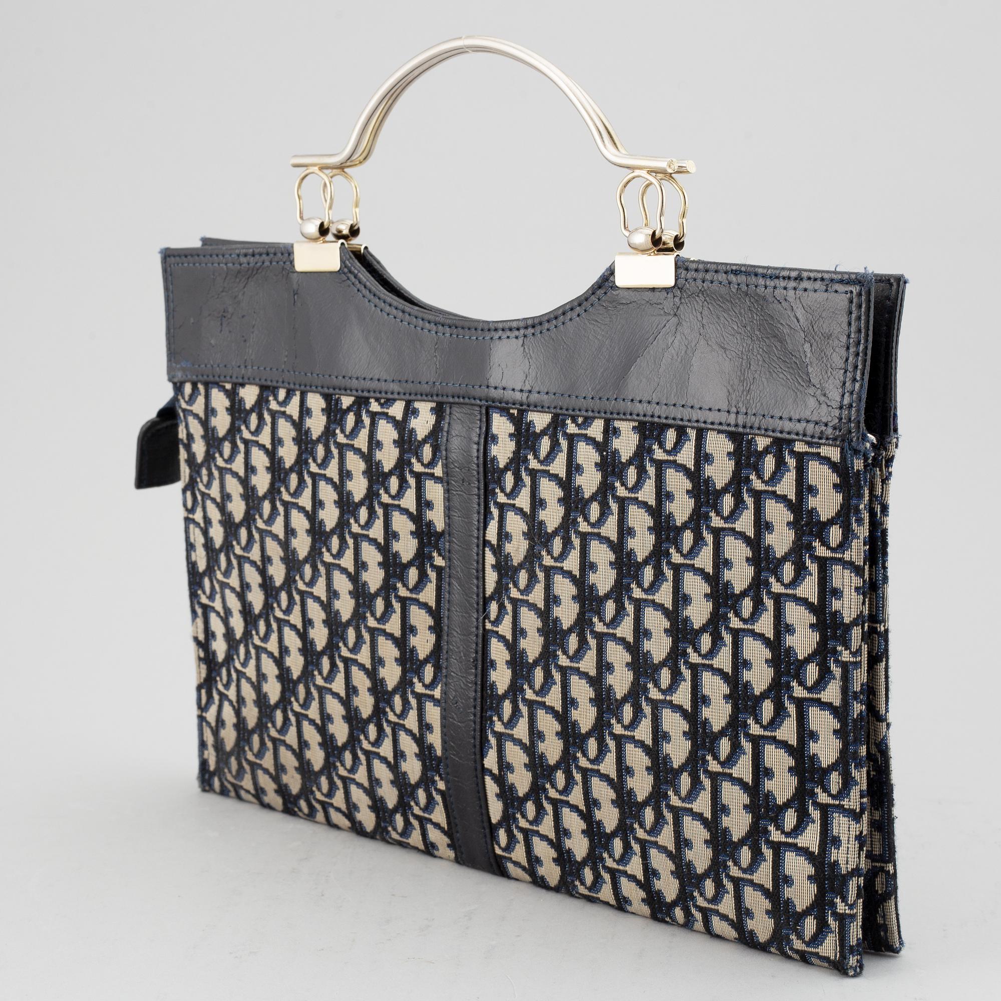 CHRISTIAN DIOR, a monogram canvas handbag.