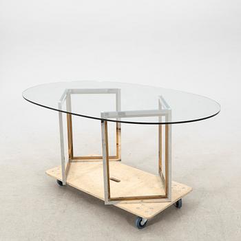 A glass and metal table by Engelsson from the 21st century.