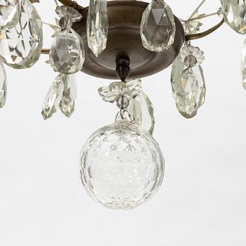A Rococo style chandelier, early 20th Century.