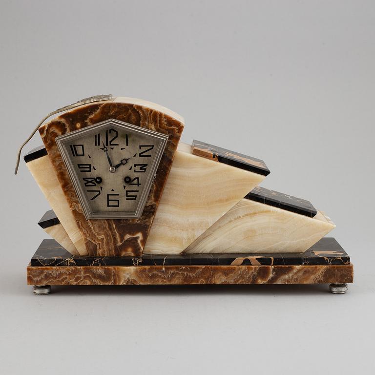 A three piece clock garniture, Art Deco style, 20th Century.