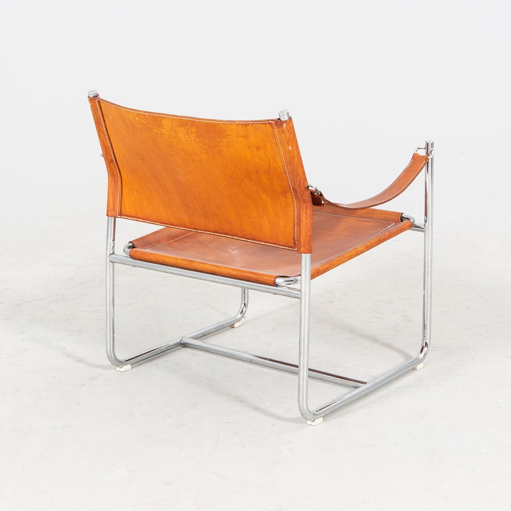 Karin Mobring, a late 20th century chrome and leather armchair from IKEA.