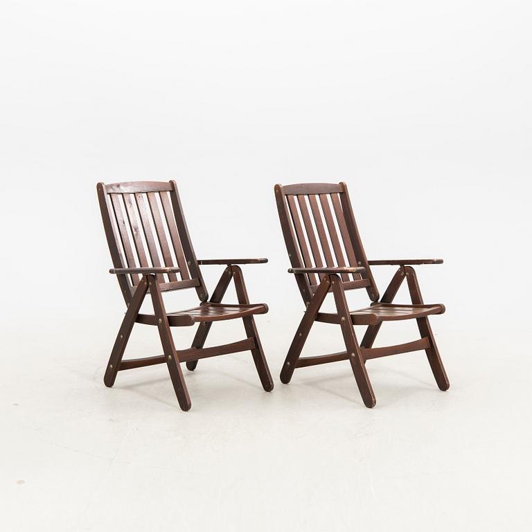 A set of five stained wood garden chairs from KWA around year 2000.