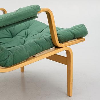 Bruno Mathsson, a pair of "Ingrid" armchairs, Dux, Sweden, second half of the 20th century.