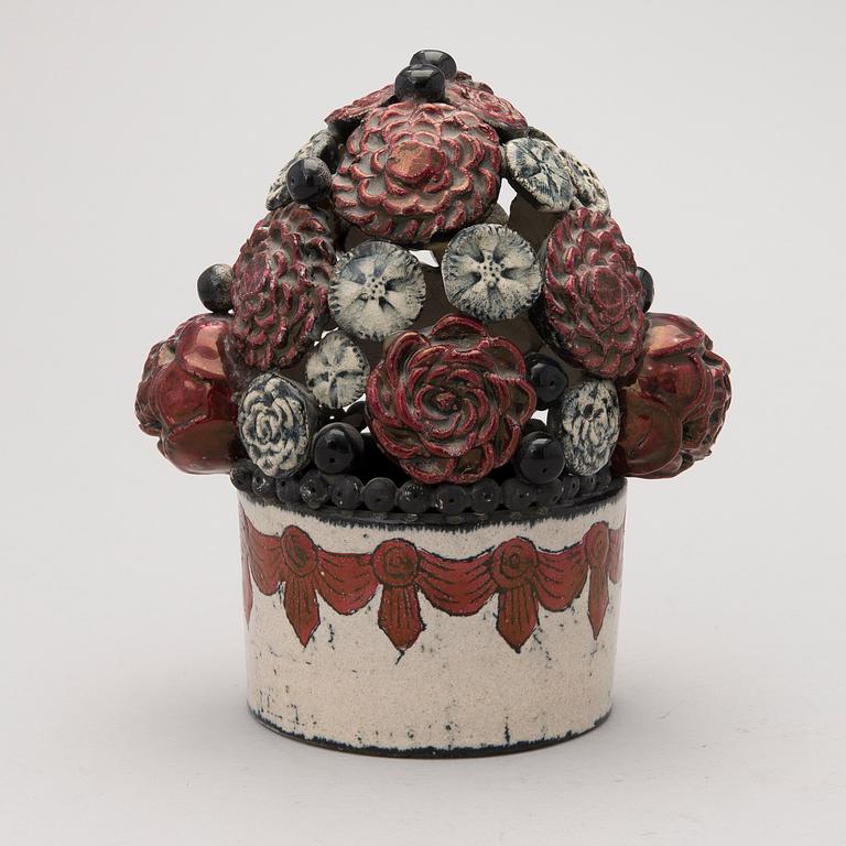 A stoneware sculpture, signed Kaipiainen Arabia.