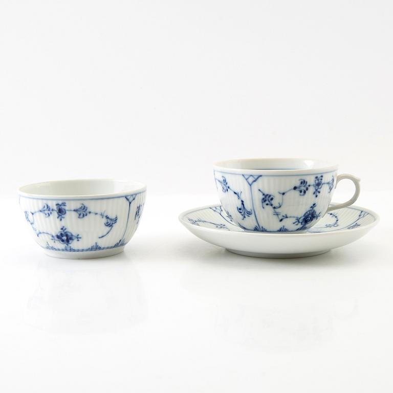 Service approximately 42 pieces "Musselmalet rifflet/halvblonde" Royal Copenhagen Denmark porcelain first half of the 20th century.