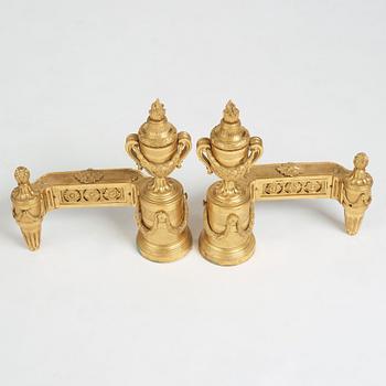 A pair of Louis XVI 18th Century bronze chenets.