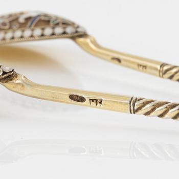 Eight Russian gilded silver and enamel spoons, Moscow, 1896-1908.