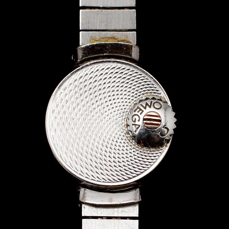 ARMBANDSUR, Omega, 18 k vitguld, med 6 briljantslipade diamanter, 1900-talets mitt. Total vikt med urverk 33 gram.