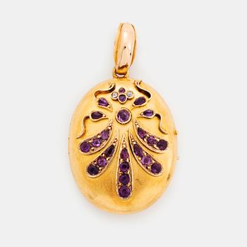 399. An 18K gold locket set with amethysts and rose-cut diamonds.