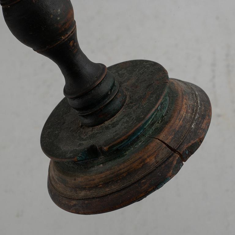 A 19th century wooden butter stand.