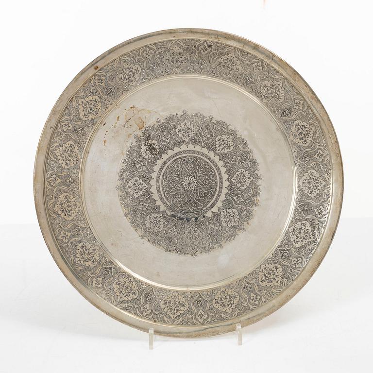 A pair of Persian silver plates, 20th century.