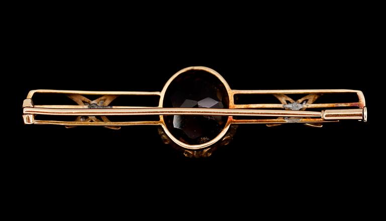BROSCH, guld och silver, med små rosenstenar, omkring år 1900.