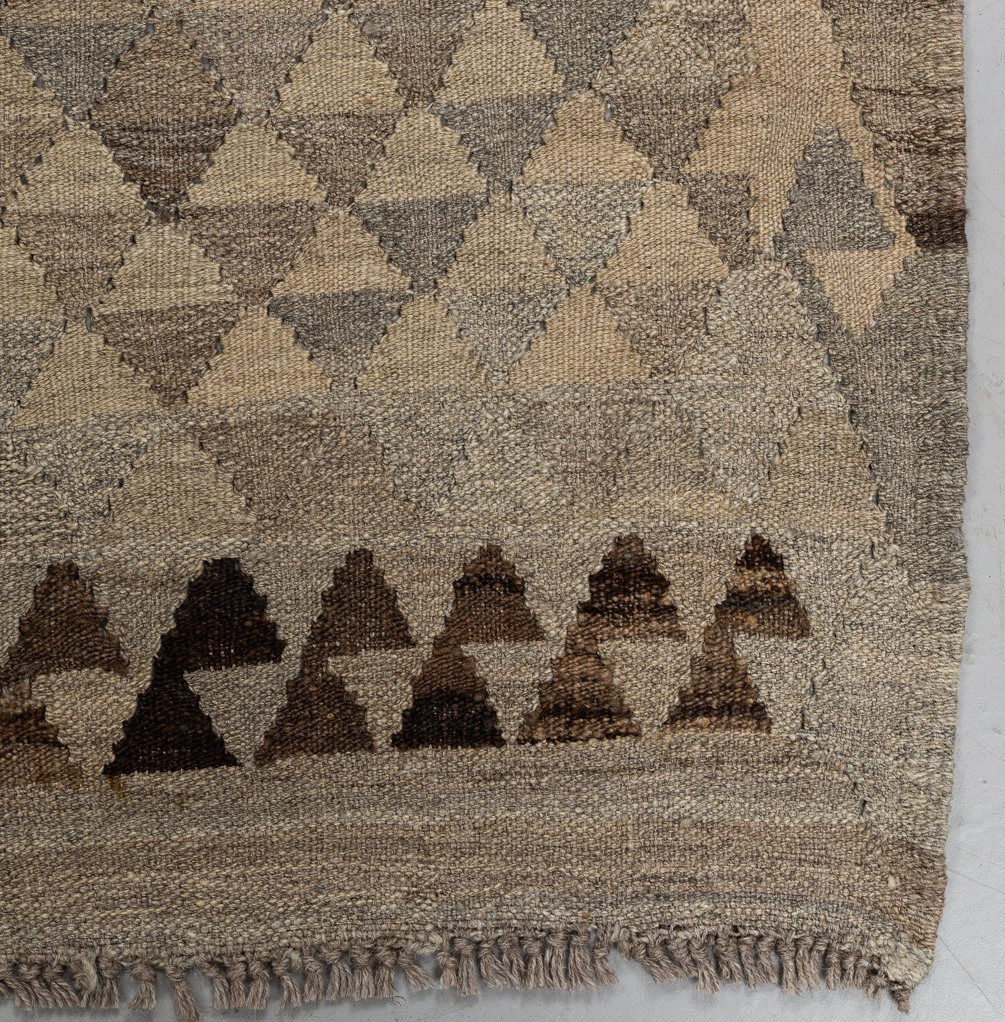 A carpet, Kilim, ca 244 x 169 cm.