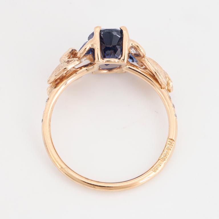 Sapphire and brilliant-cut diamond ring.