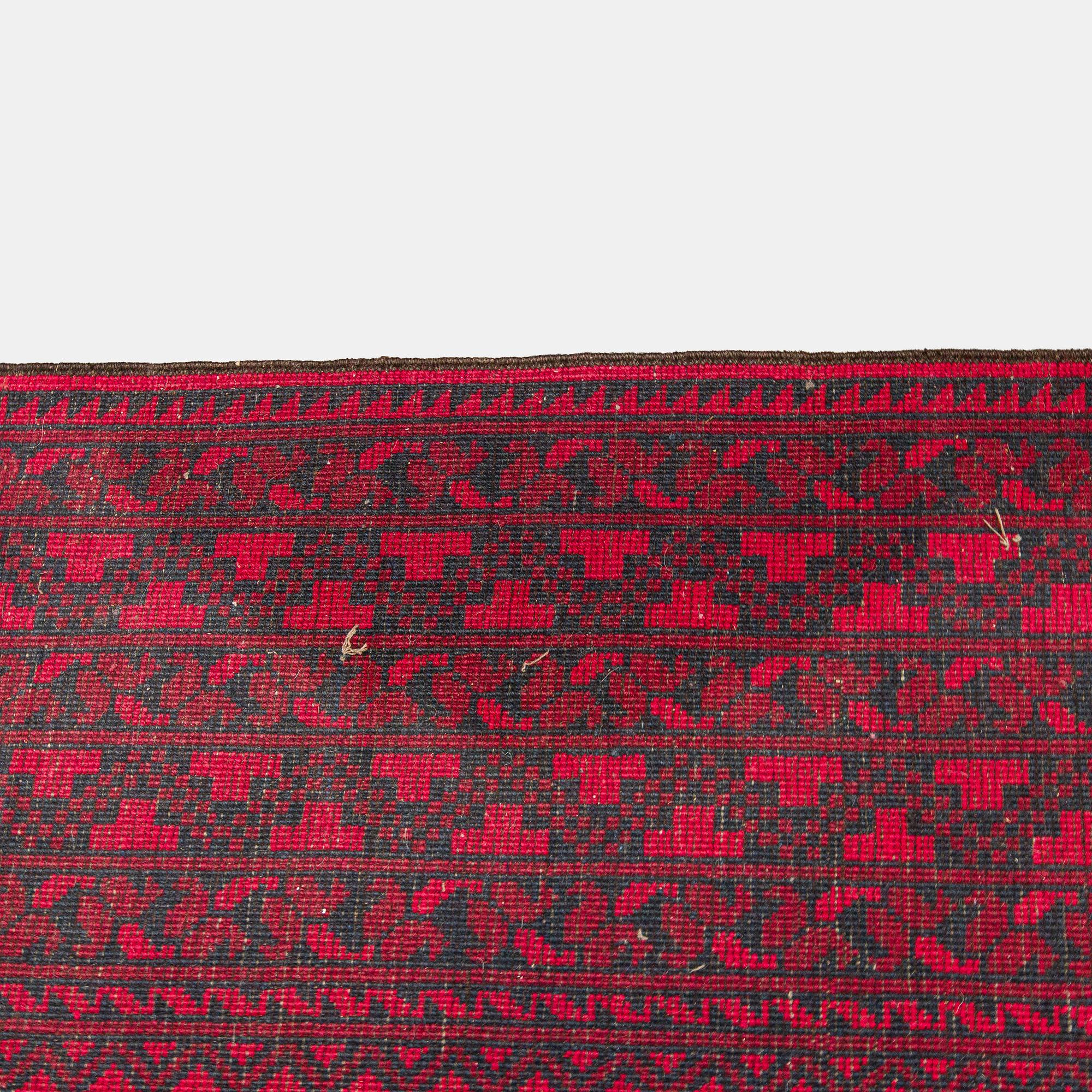 Two Afghan carpets. Ca. 326 x 217 and 88 x 63 cm.