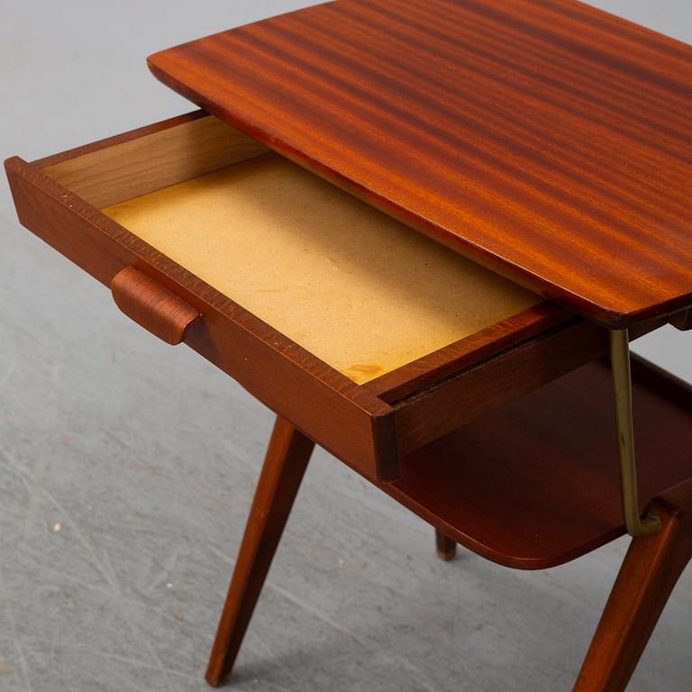 A 1940/50's pair of mahogany bedside tables.