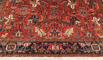 A semi-antique Heris rug, c. 287 x 230 cm.
