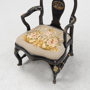 A painted rococo armchair, mid 18th Century.