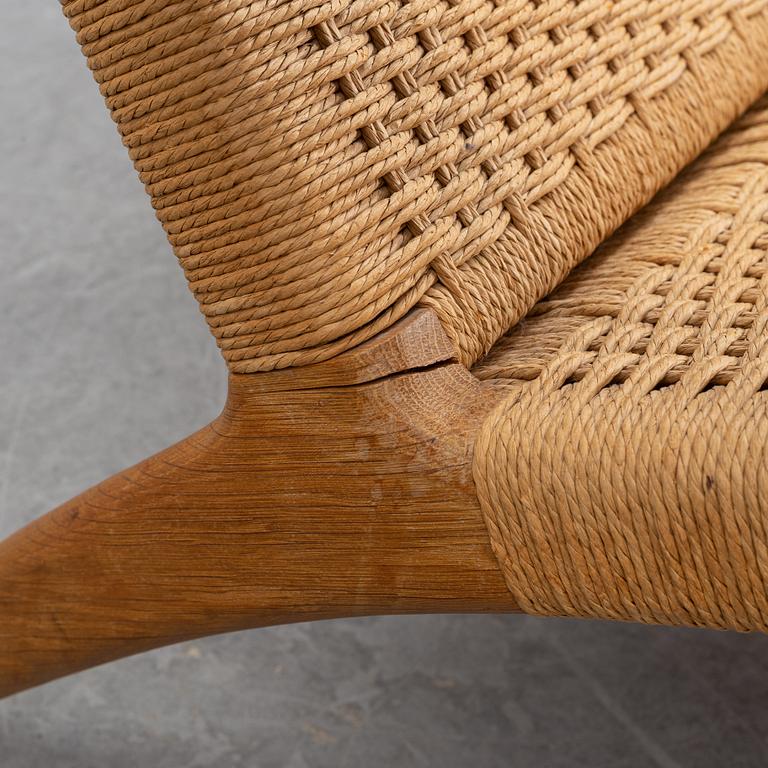 A 'CH-25' armchair designed by Hans J Wegner for Carl Hansen & Søn, Denmark.