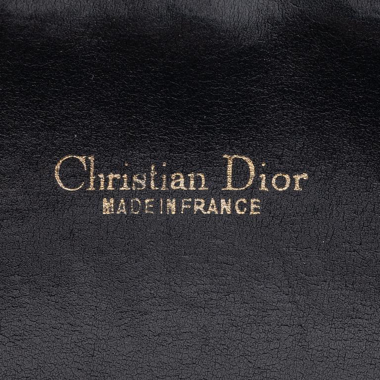 Christian Dior, a canvas bag.