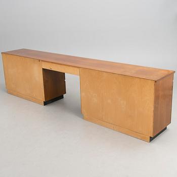 A 1960s sideboard and a stool, for Paul Boman, Finland.