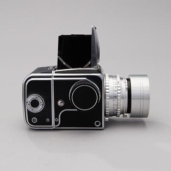 A 1955 HASSELBLAD 1000F CAMERA WITH ACCESSORIES.