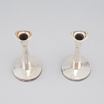 A pair of silver candle sticks by Tore Eld in gothenburg, Sweden, 1959.