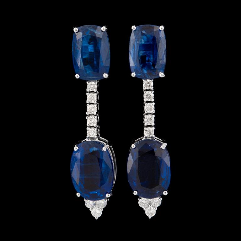A pair of blue kyanite and diamond earrings.
