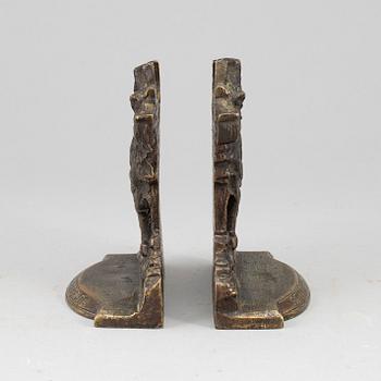 A pair of bronze 20th century book ends.