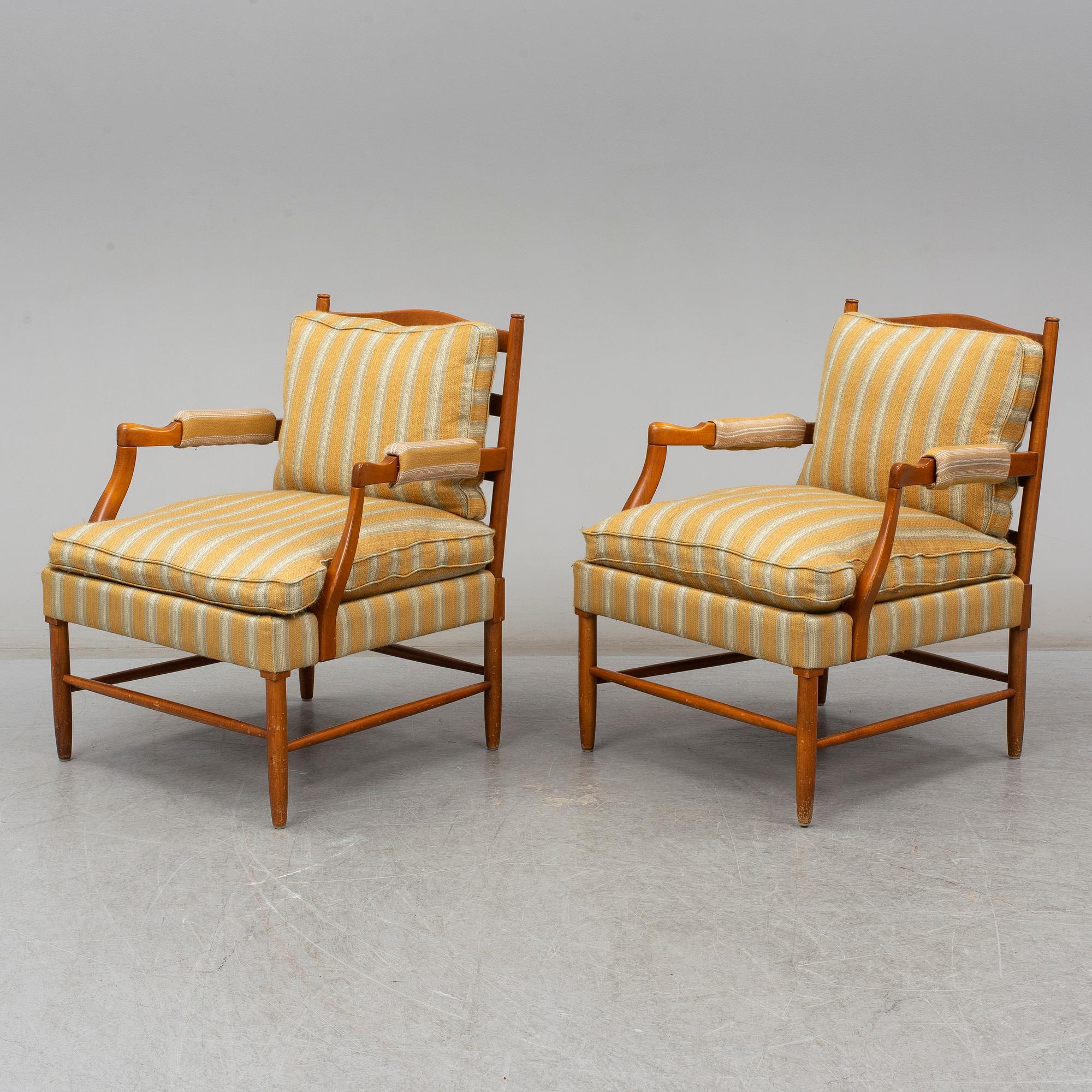 a pair of armchairs from the second half of the 20th century.