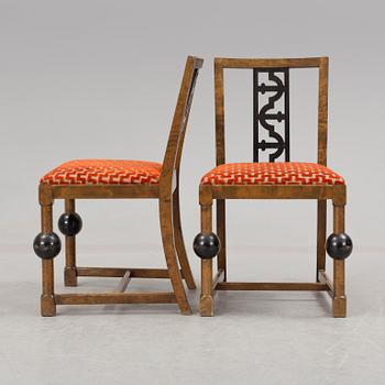 A pair of art déco chairs.