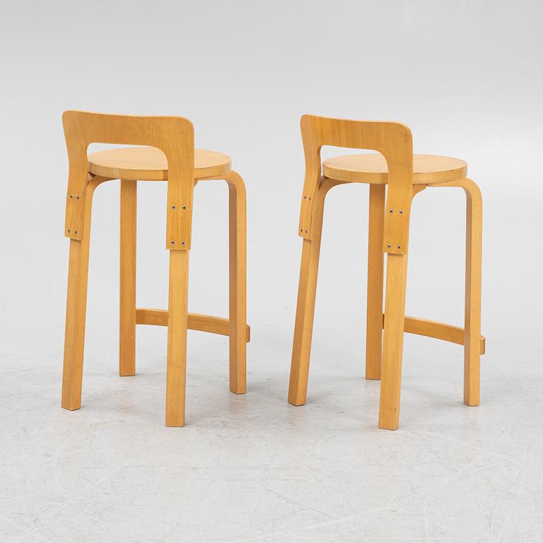 Alvar Aalto, two model 'K65' bar stools, Artek, Finland.