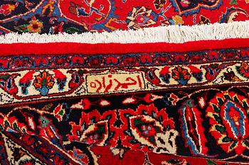 A Najafabad carpet, c. 351 X 305 cm.