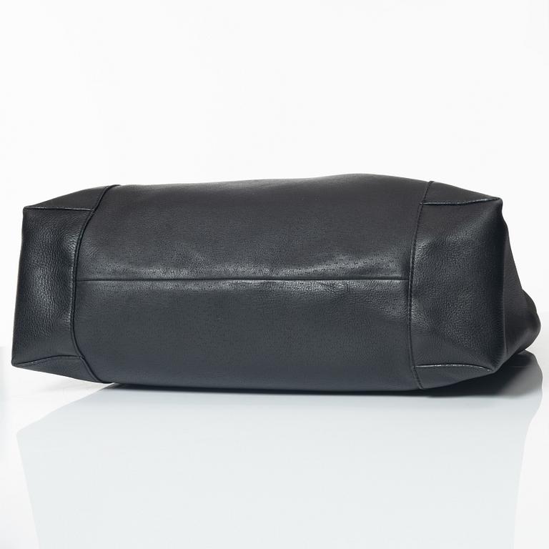 Gucci, A black leather hobo bag.