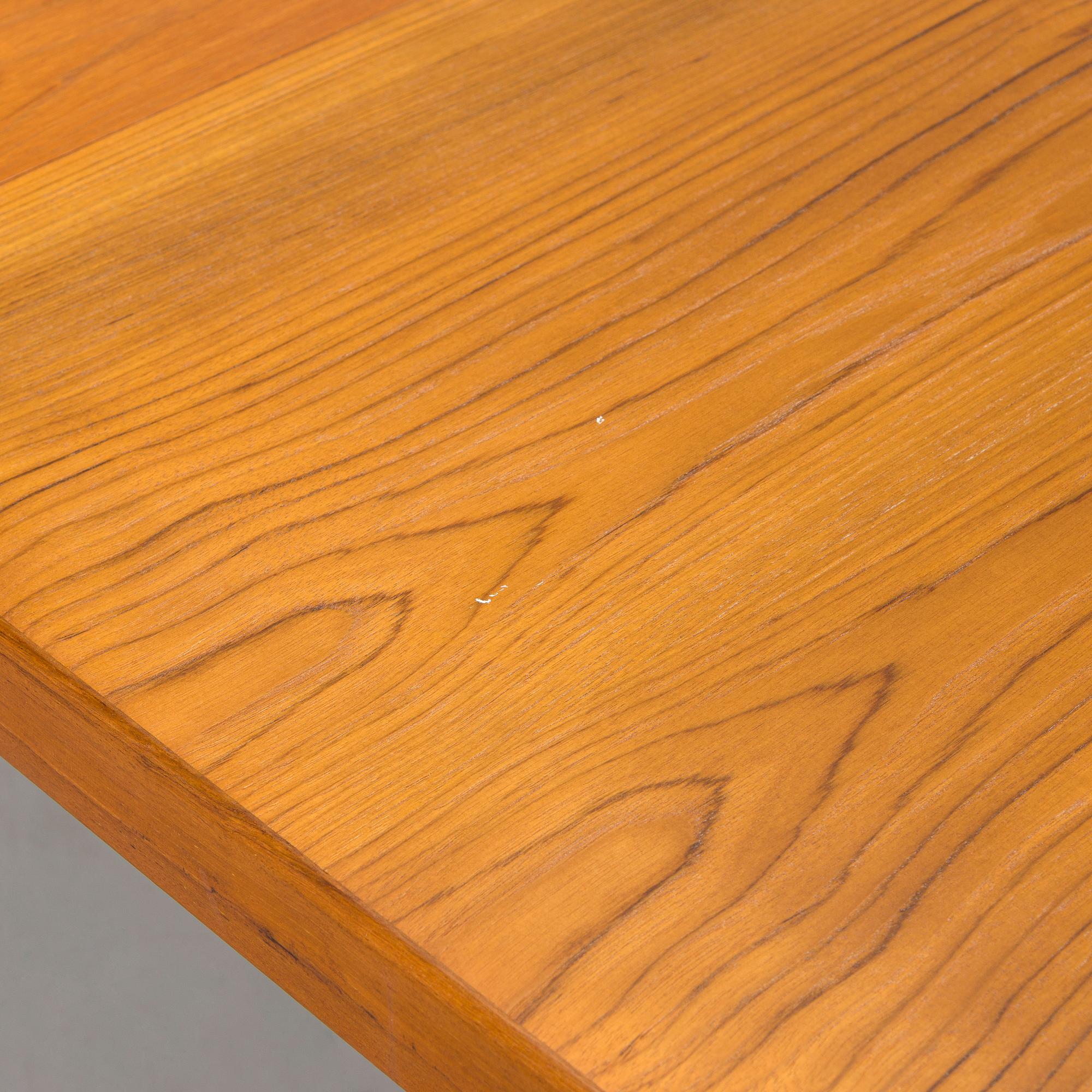 A mid-20th century dining table.