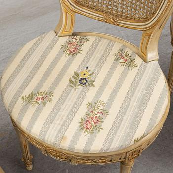 A set of four Louis XVI-style chairs from the early 20th century.