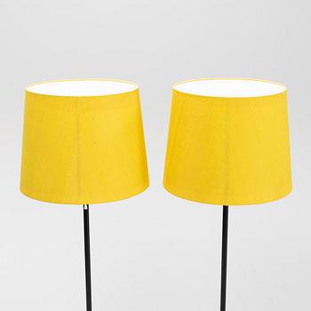 A pair of black metal floorlights, Luxus, Vittsjö.