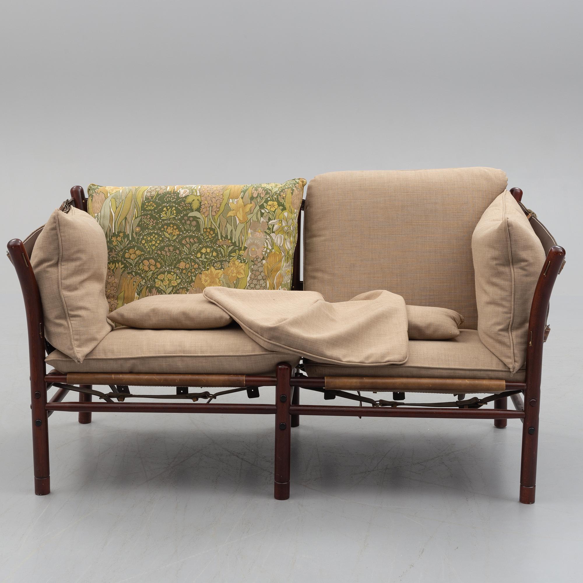 ARNE NORELL, an 'Ilona' stained wood and leather sofa fron Norell Möbel, Aneby, 1960's/70's.