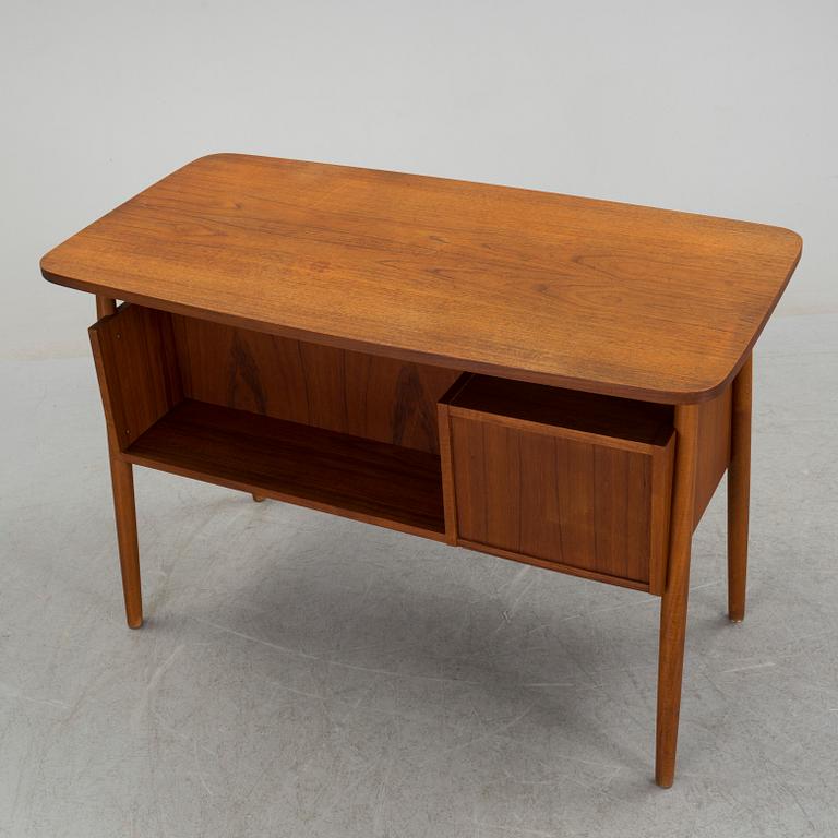 A mid 20th century writing desk from Tibergaard Denmark.