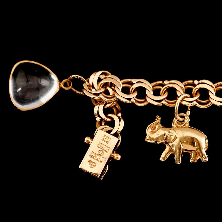 BERLOCKARMBAND, 18 k guld, 1959, bismarcklänk. Vikt ca 13 gram.