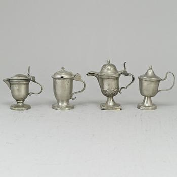 Eight pewter mustard pots, 18th/19th century.