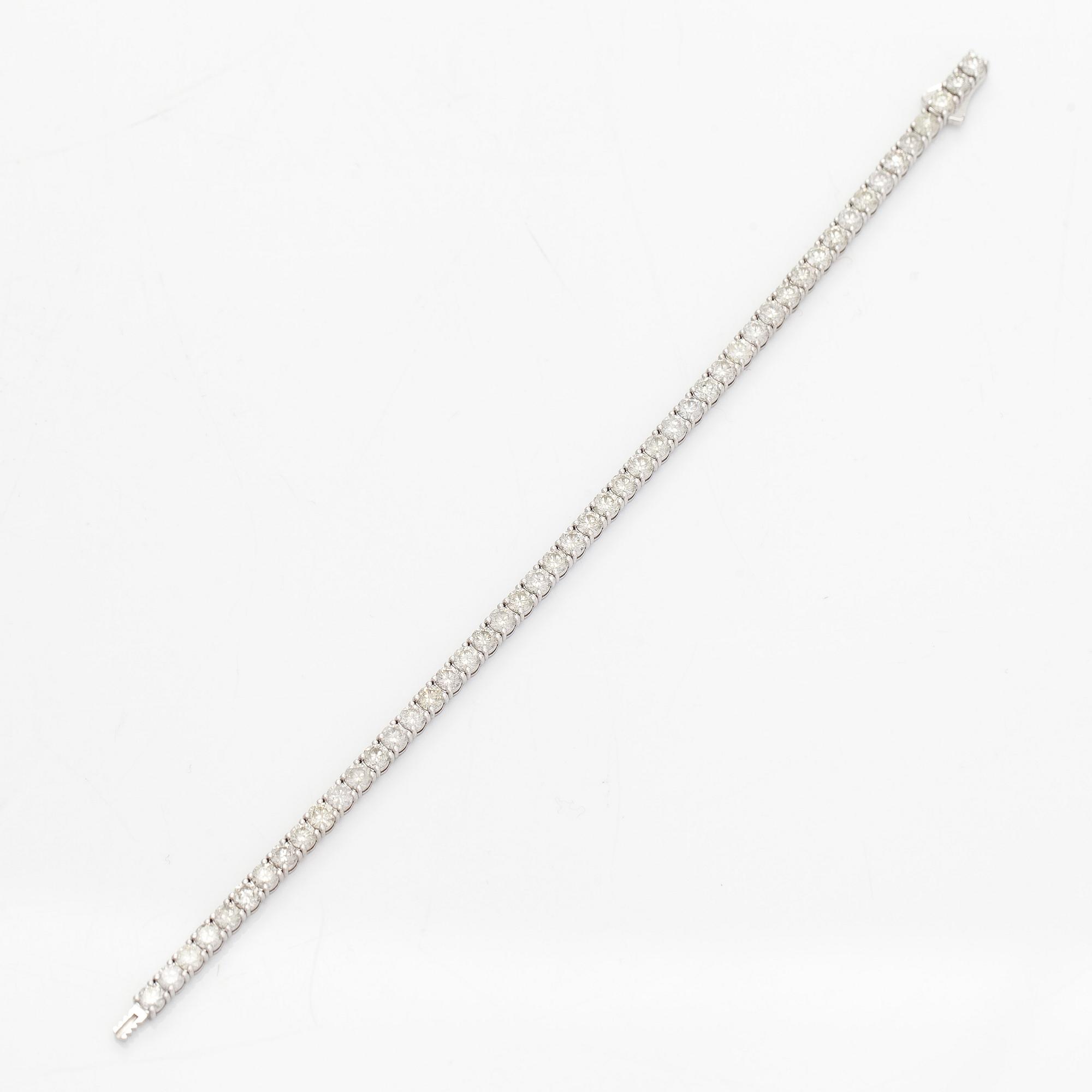 Tennis bracelet, brilliant cut diamonds, 14K white gold.
