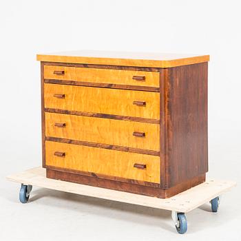 A 1940s Art Deco birch dresser.