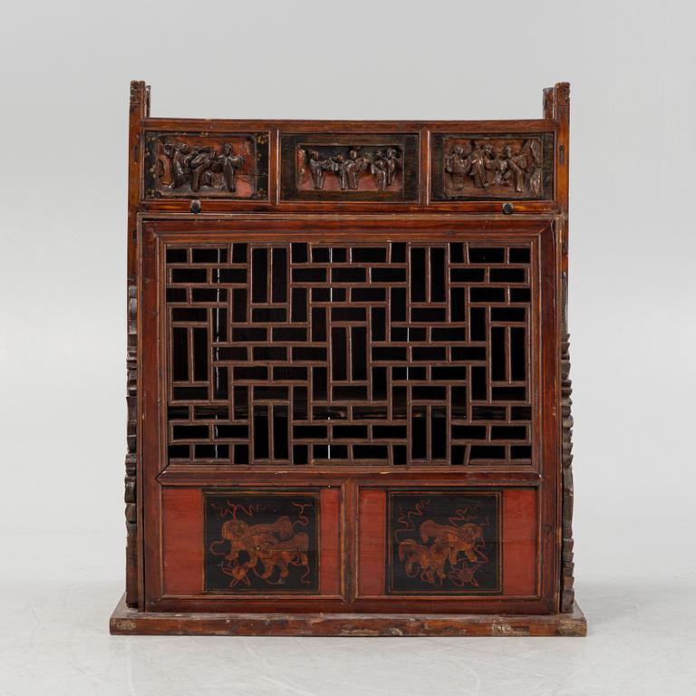 A cabinet, China, 20th century with older parts.