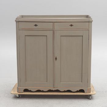 A sideboard, circa 1900.