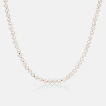 725. A cultured Mikimoto pearl necklace with a gold and diamond clasp.