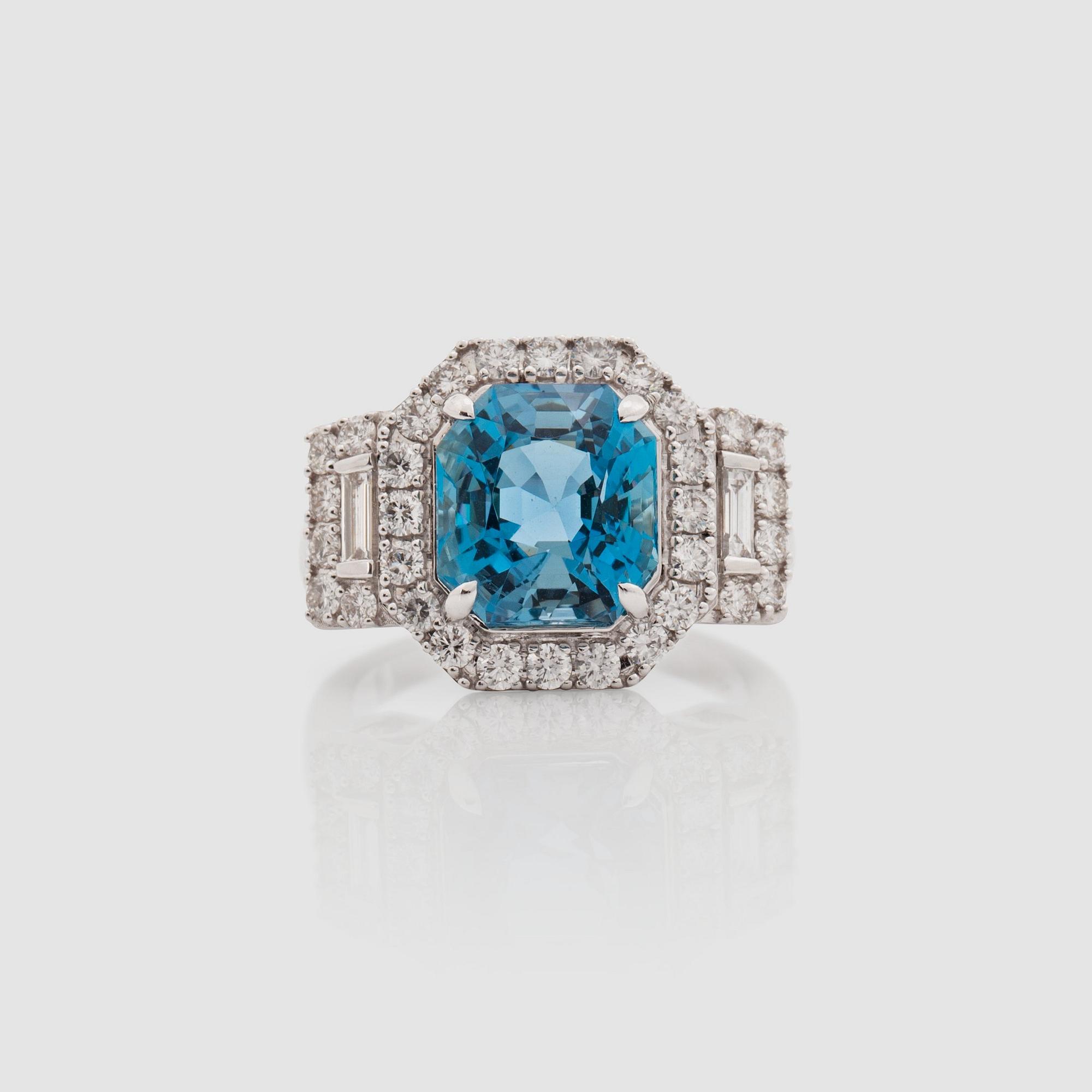 An aquamarine, 4.50 ct, brilliant- and baguette-cut diamond ring.